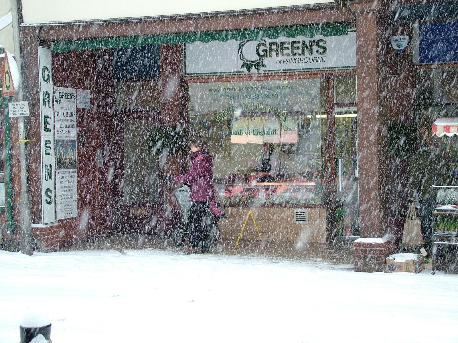 Green's shop front on Whitchurch Road in the snow