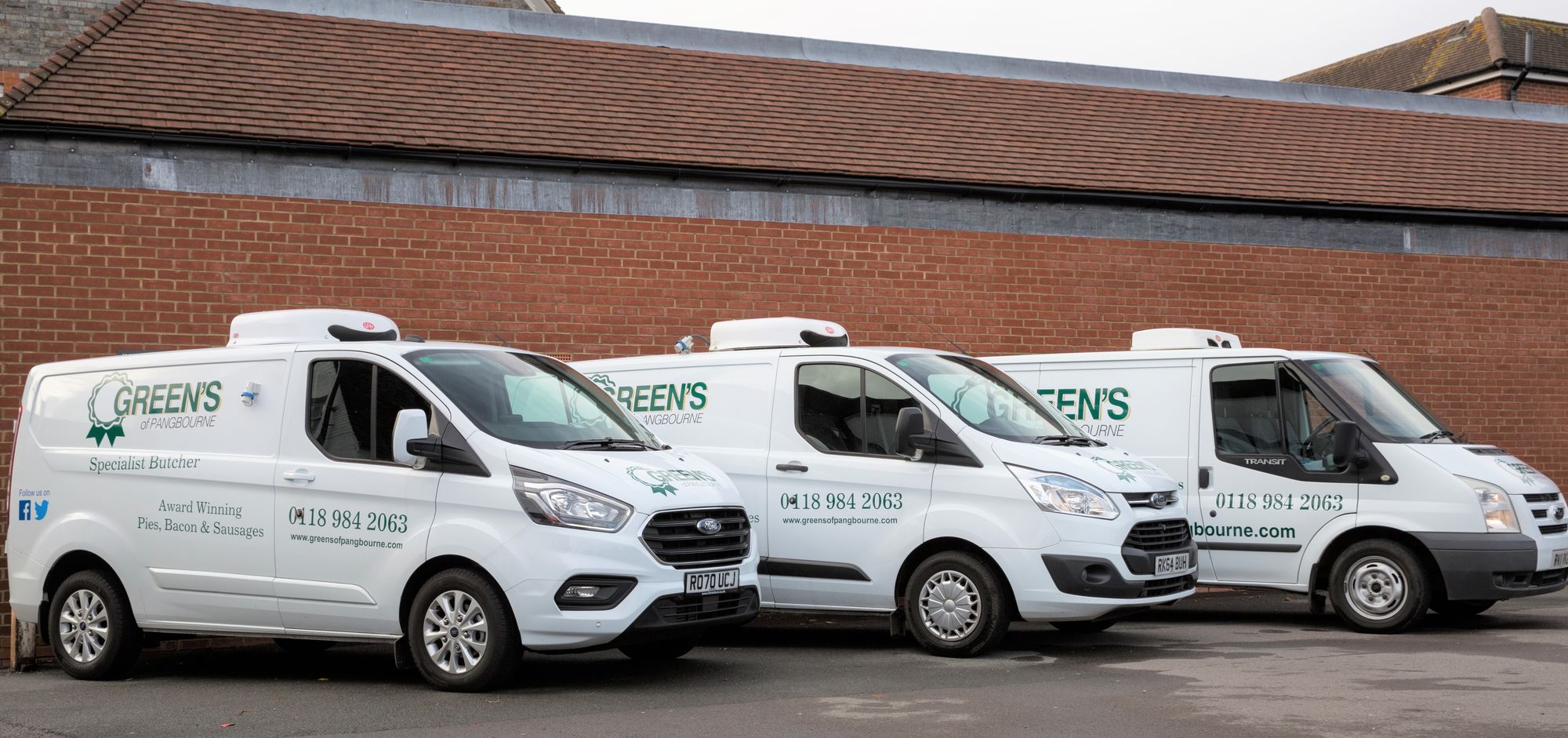 Three Green's delivery vans